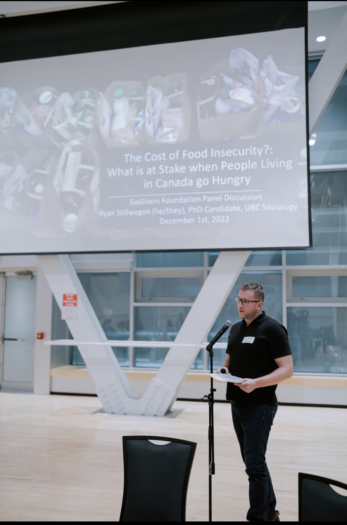 Ryan Stillwagon giving a lecture on food insecurity in Canada